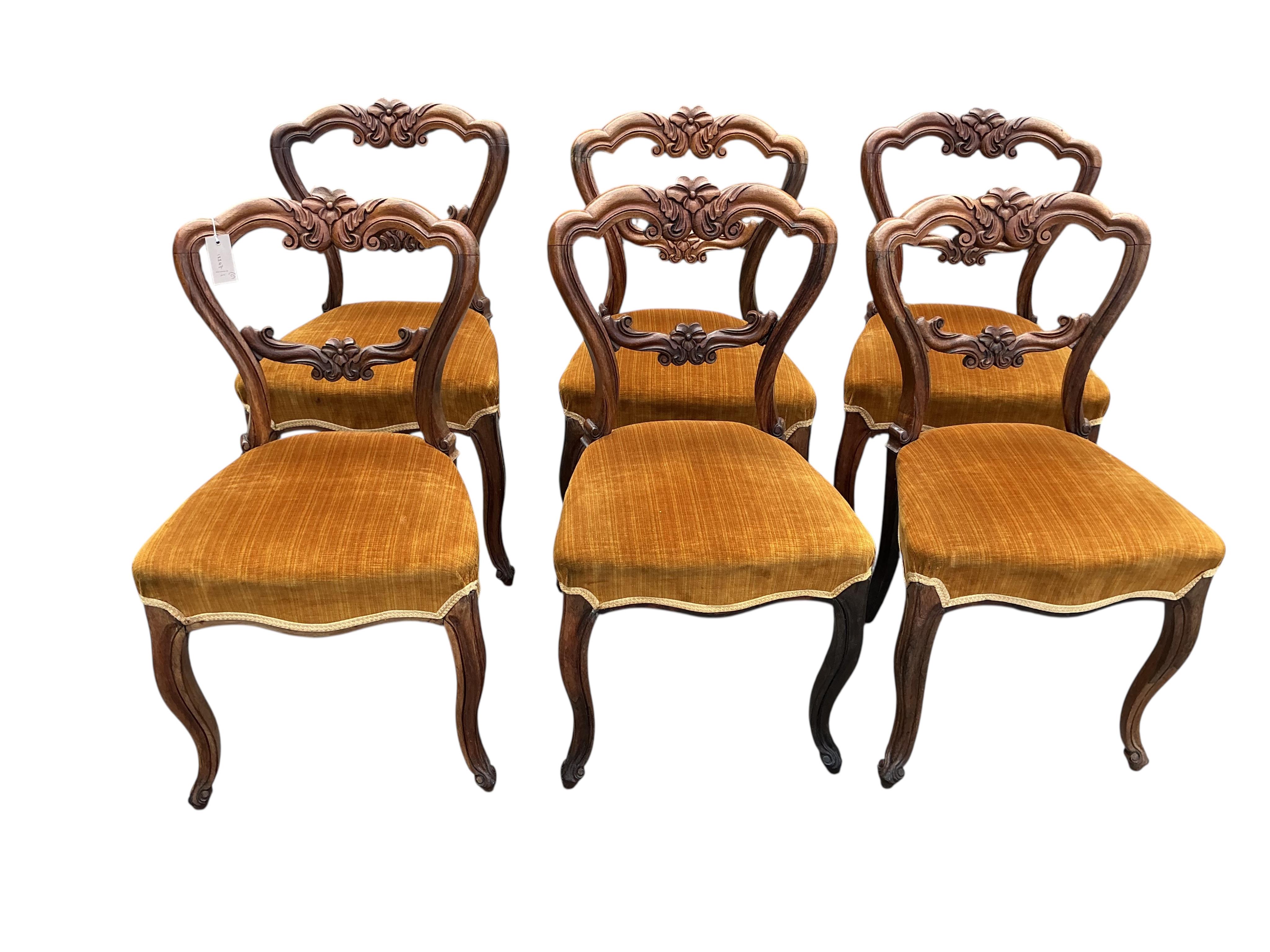 A set of six early Victorian rosewood dining chairs, width 46cm, height 80cm